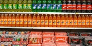 Sugar-sweetened beverages on the shelves of a grocery store